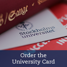 The university card and a stack of books